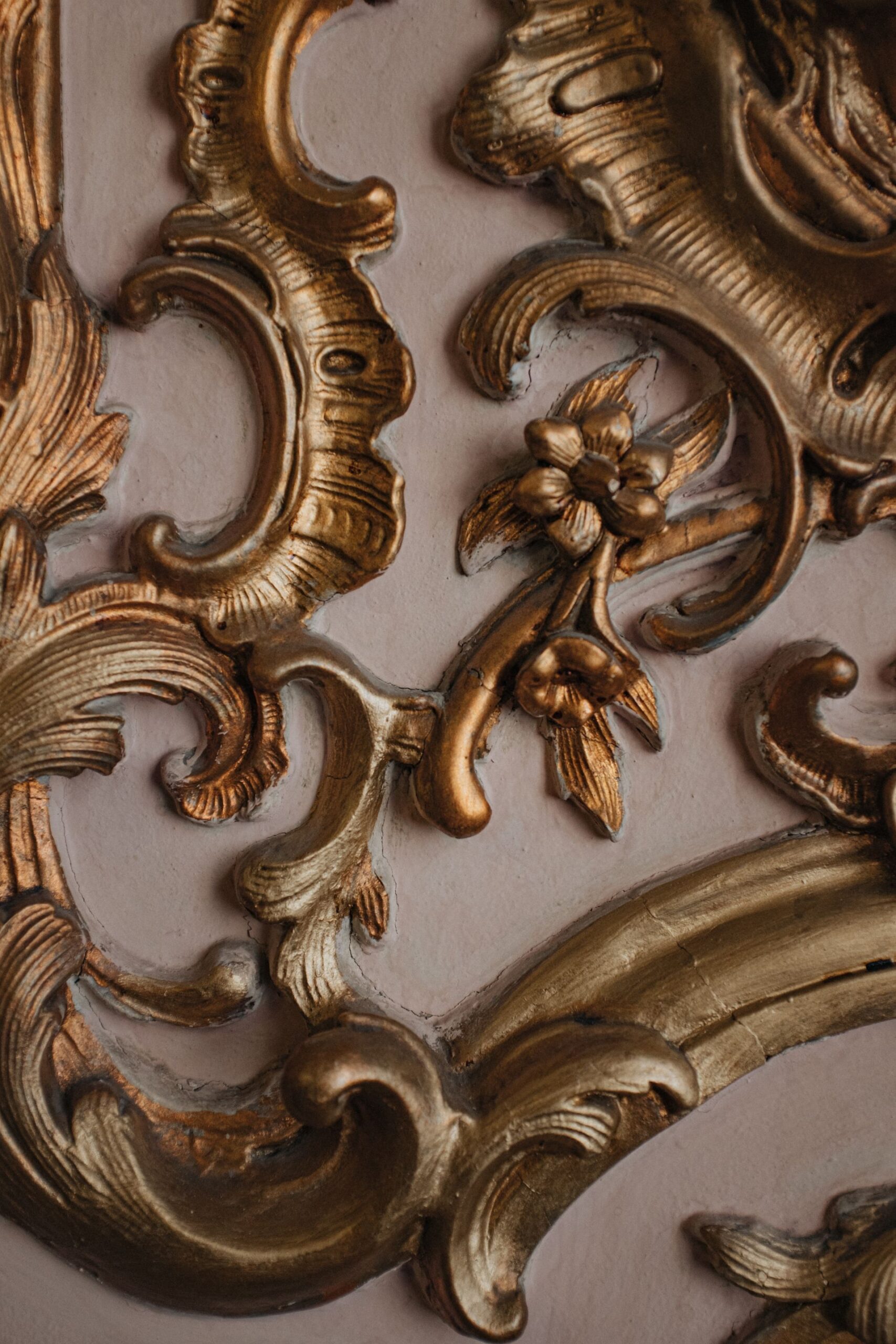 Gilder applying gold leaf in Florence workshop